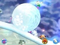 A snowball chasing from behind in Over Wintry Mountains.