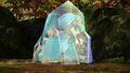 Cyan fragments encased in a crystal.